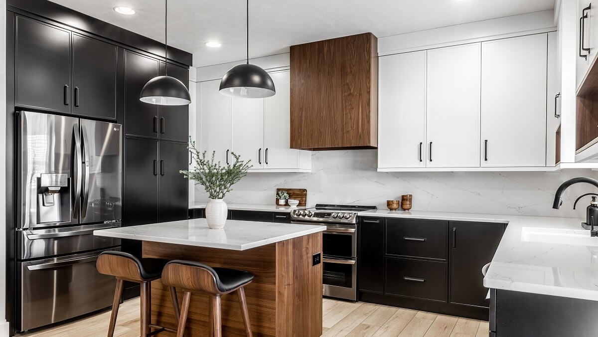 Modern kitchen with black and white cabinets