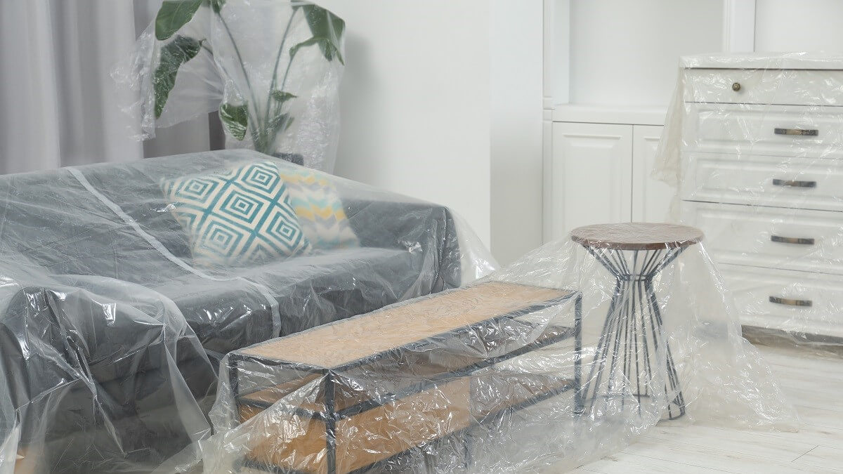 Plastic covers over furniture for HVAC install